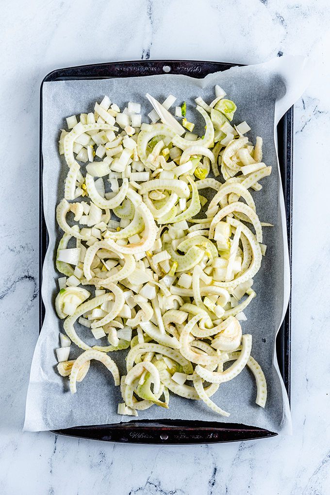 Roasted Fennel and Potato Soup - chopped fennel and onion on a baking tray
